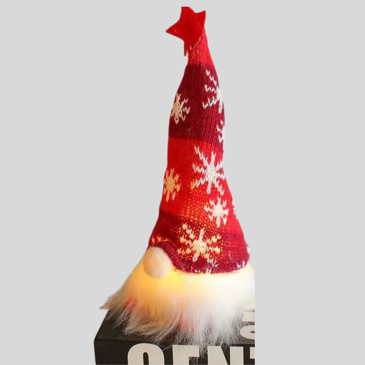 Sett med lysende nisser i plysj, festlig juledekorasjon med varmt LED-lys. Ideell for vinterpynt.