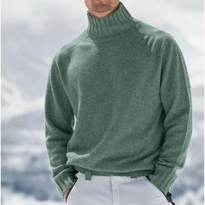 Luksuriøs kasjmirgenser for menn med høy turtleneck. Varm, komfortabel og elegant herregenser i strikk.