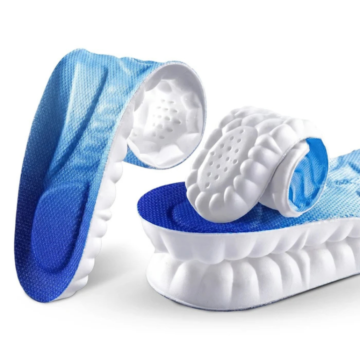 Ergonomiske innleggssåler designet for å forbedre stabilitet og redusere tretthet i føttene gjennom dagen.