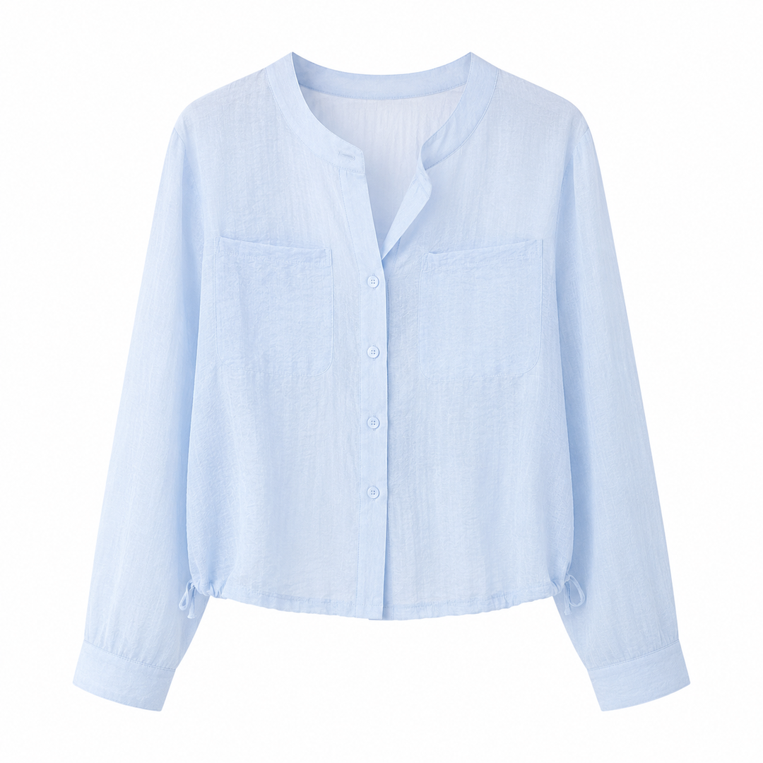 Komfortabel oversized sommertopp til dame. Luftig, transparent design for vår og sommer. Justerbar og elegant.