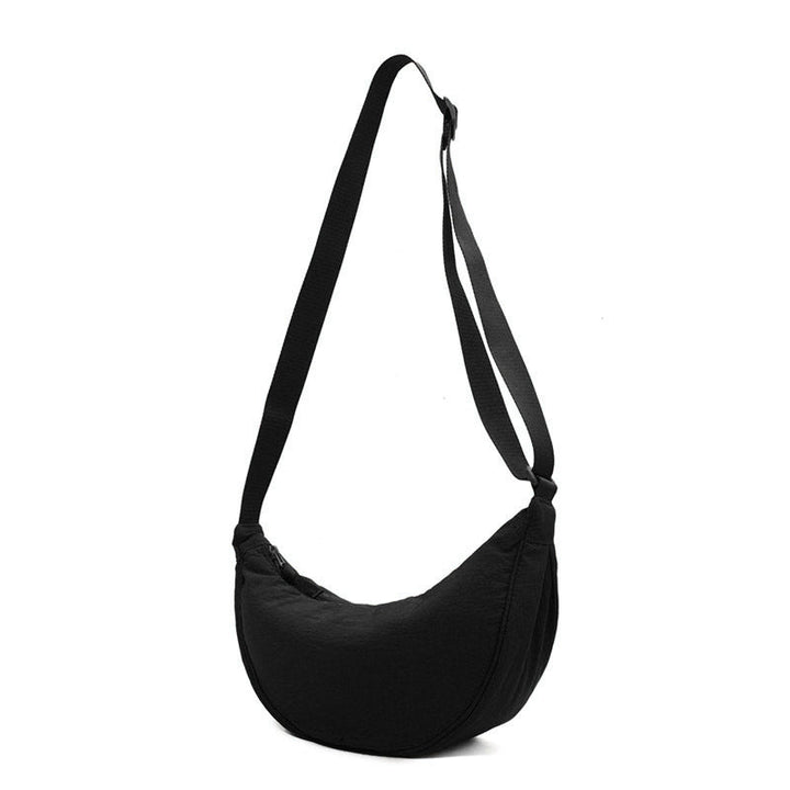 Allsidig unisex veske, kan brukes som crossbody eller skulderveske, ideell for alle anledninger.