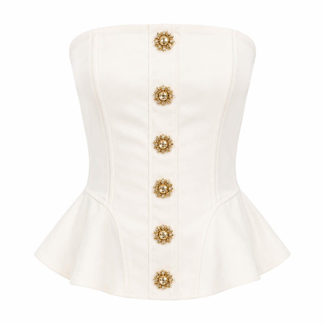 Trendy hvit stroppeløs croptop for dame med 3D-detaljer og ryggløs design. Stilig festtopp.