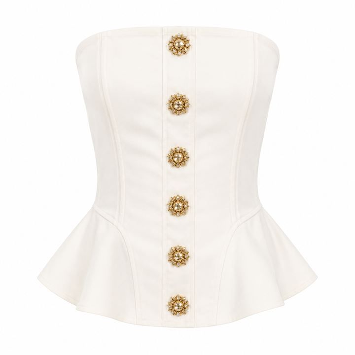 Trendy hvit stroppeløs croptop for dame med 3D-detaljer og ryggløs design. Stilig festtopp.