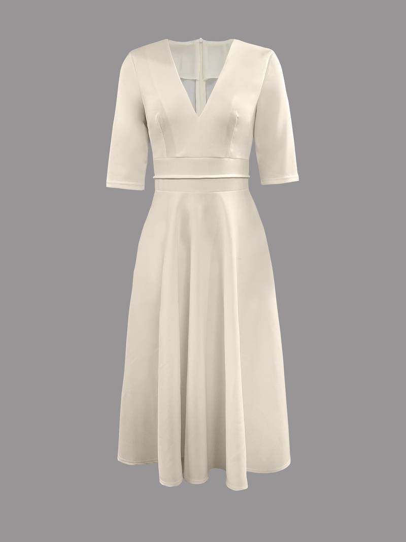 Stilig retro swingkjole for kvinner, perfekt som 60-talls festkjole eller elegant sommerkjole.