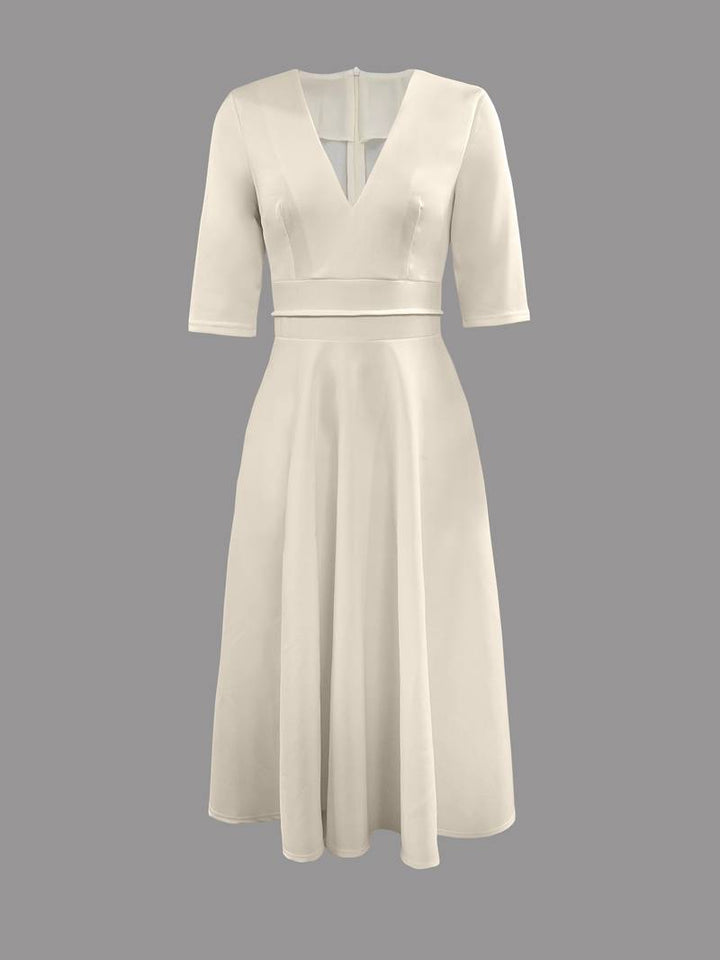 Stilig retro swingkjole for kvinner, perfekt som 60-talls festkjole eller elegant sommerkjole.