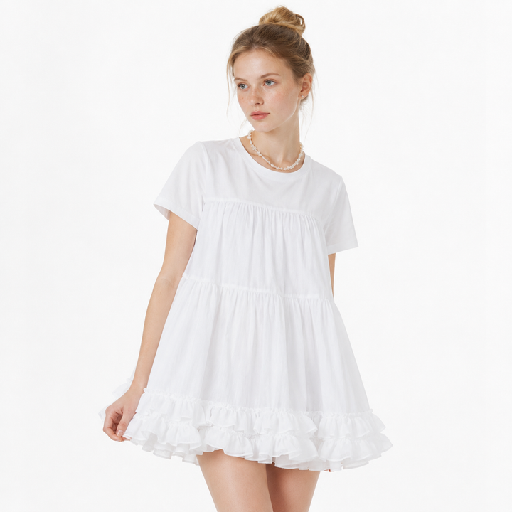Hvit damet-skjorte med stilrene meshdetaljer. Moderne og luftig sommertopp for en casual, unik stil.