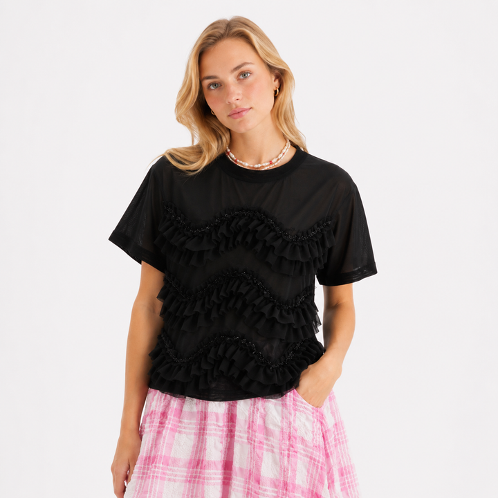 Kvinnemote kortermet topp med unik stil, perfekt for moderne sommergarderobe. Elegant og fleksibel.
