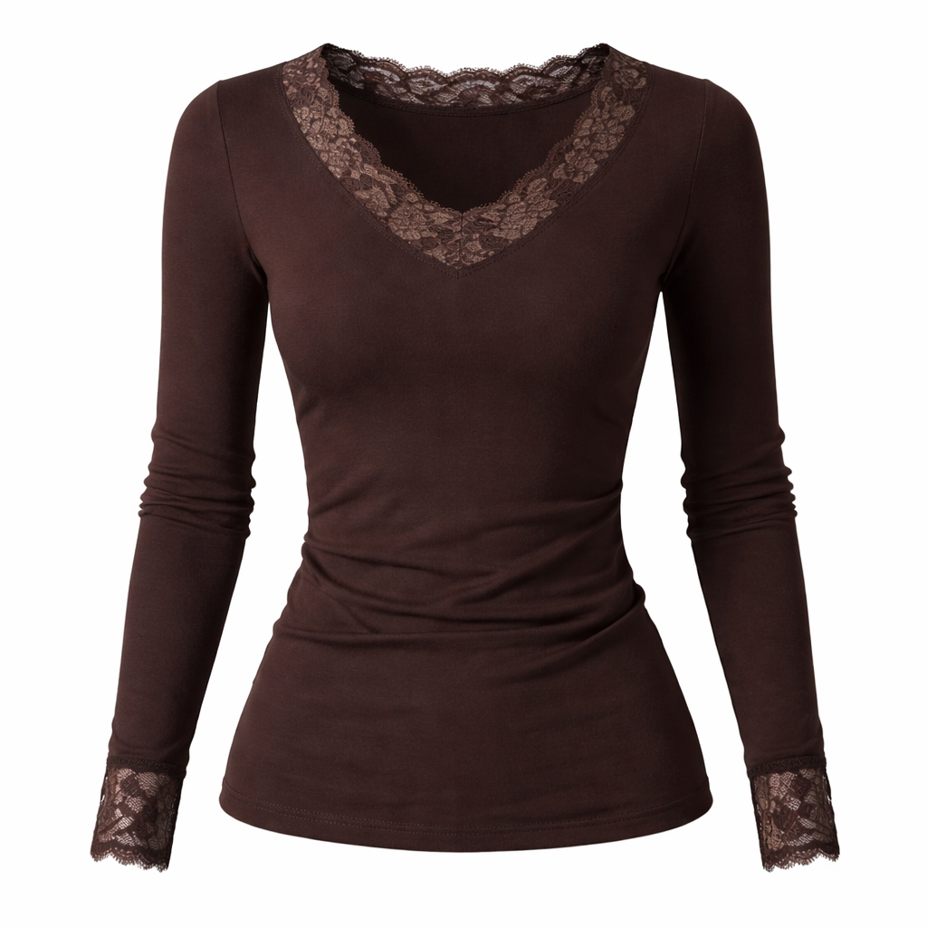 Hvit, trendy blondetopp til dame. V-hals og cropped snitt, perfekt for sommer og fest.