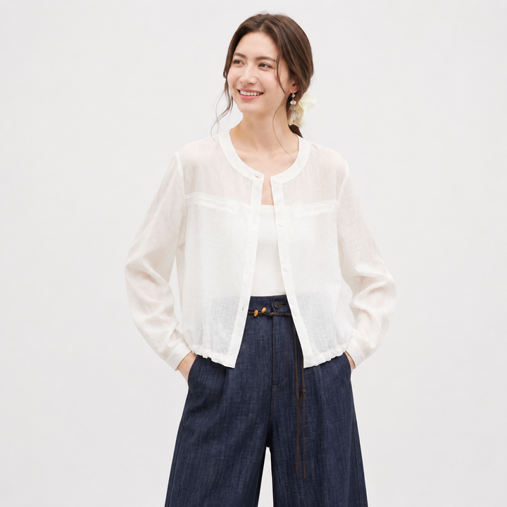 Oversized dame topp, luftig og transparent for sommeren. Elegant casual stil med rund hals og lange ermer.