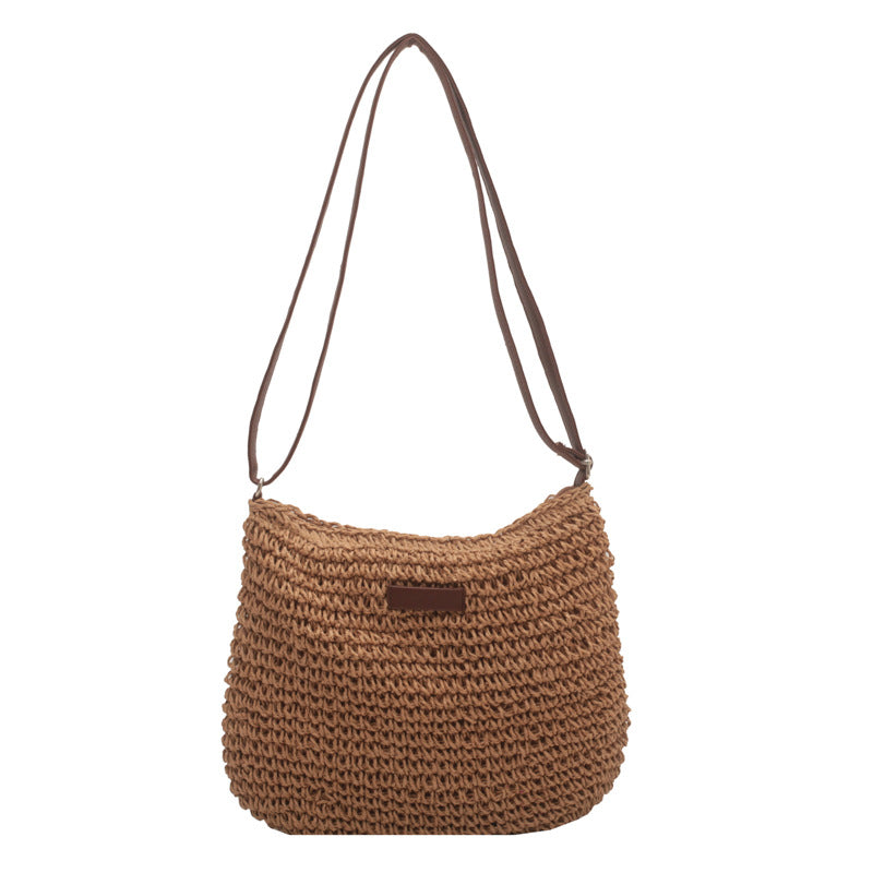 Vevd dame skulderveske i elegant brun og beige design. En allsidig håndveske og accessoir for kvinner.