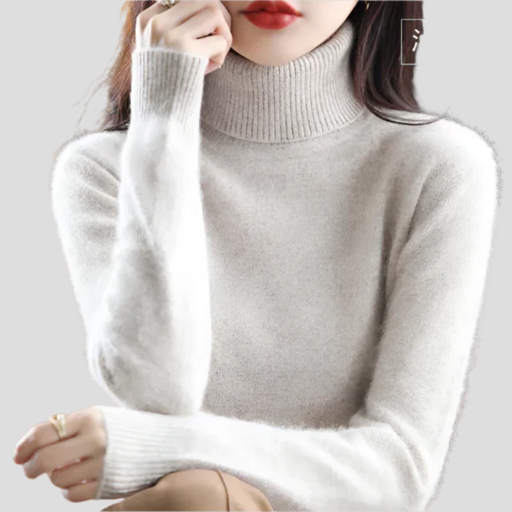 Stilfull genser med høy hals for kvinner. Elegant, strikket turtleneck som passer til både mote og arbeidsplagg.
