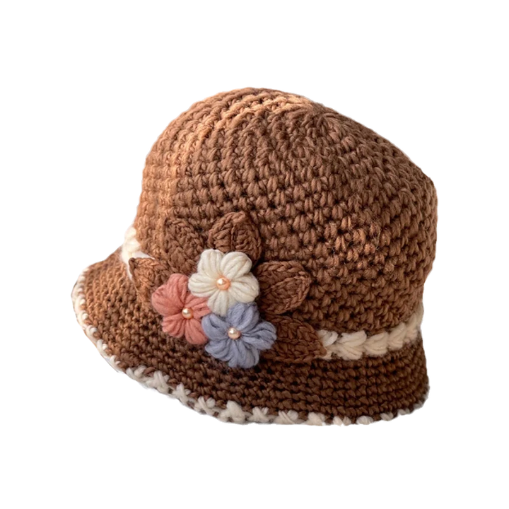 Elegant fransk ullhatt for kvinner med vakkert blomstermønster. Varm strikket lue for vinteren.