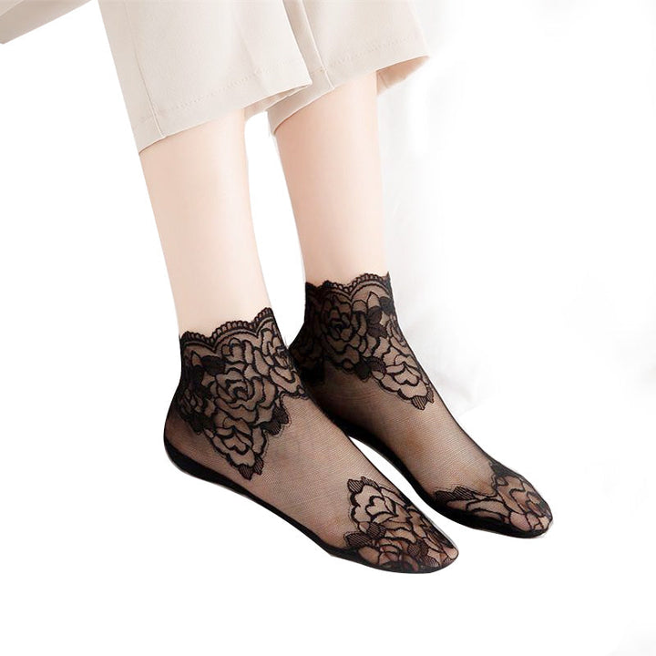 Elegante kvinner blondesokker med rosedesign, myke og pustende nettingsokker for sommer.