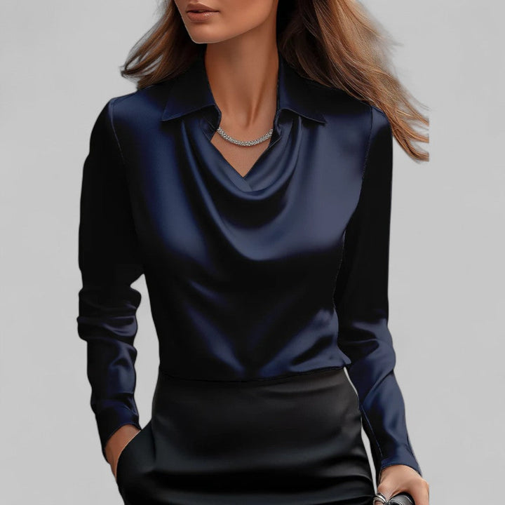 Mote topp for kvinner. Elegant langermet bluse med flatterende vannfallutringning.