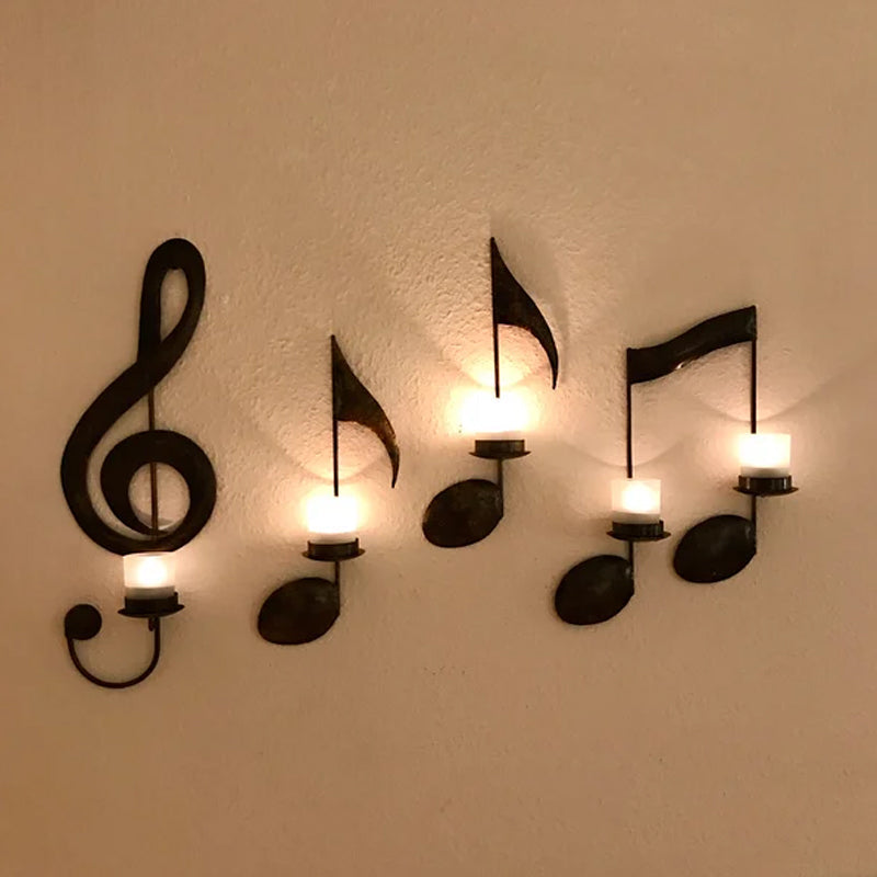 Svart veggdekor med musikknoter og g-nøkkel. Unik metall lysestake for et musikalsk hjem.