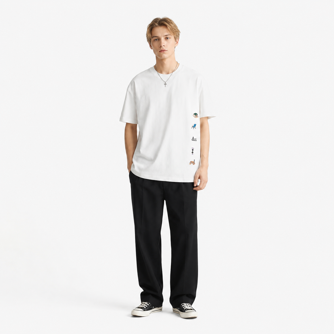 Retro herre t-skjorte med brodert mønster og løs passform. Ideell for avslappet stil og streetwear om sommeren.