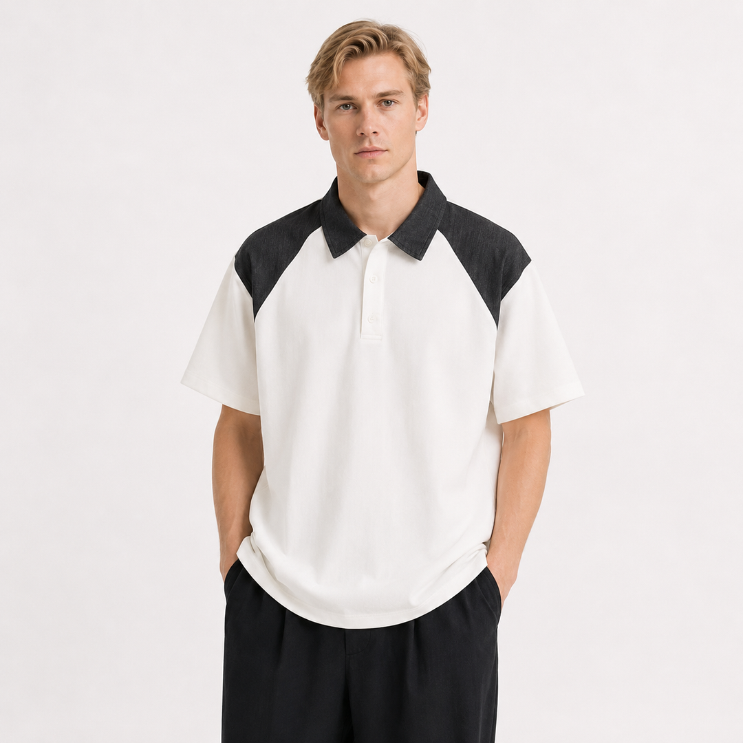 Mote-poloskjorte til herre med unikt patchwork-mønster; kortermet piké for moderne stil og komfort.