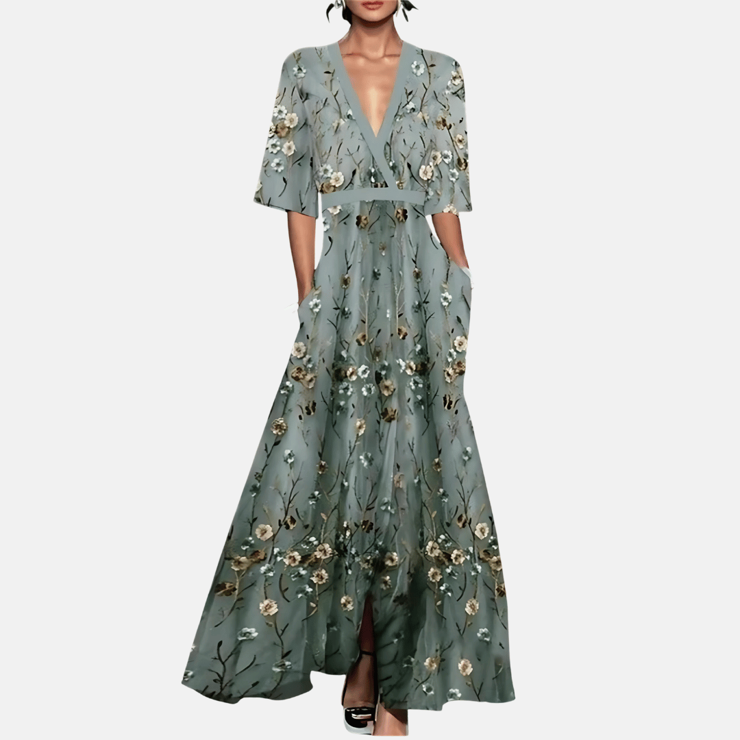 Elegant blomstret maxikjole for kvinner med V-hals, perfekt for sommeren, strand eller casual bruk.