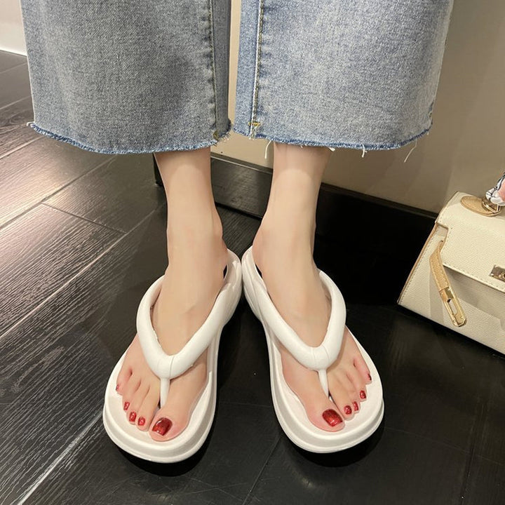 Lettvekt kvinner flip-flops med tykk såle, enkel å pakke for reise og stranddager.