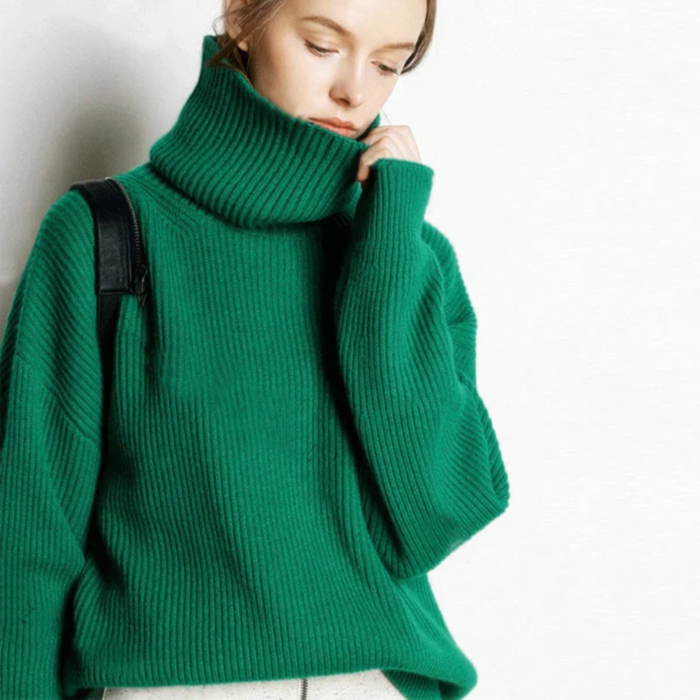 Komfortabel & chic dame strikkegenser med polokrage. Langermet, overdimensjonert stil perfekt for avslappet mote.
