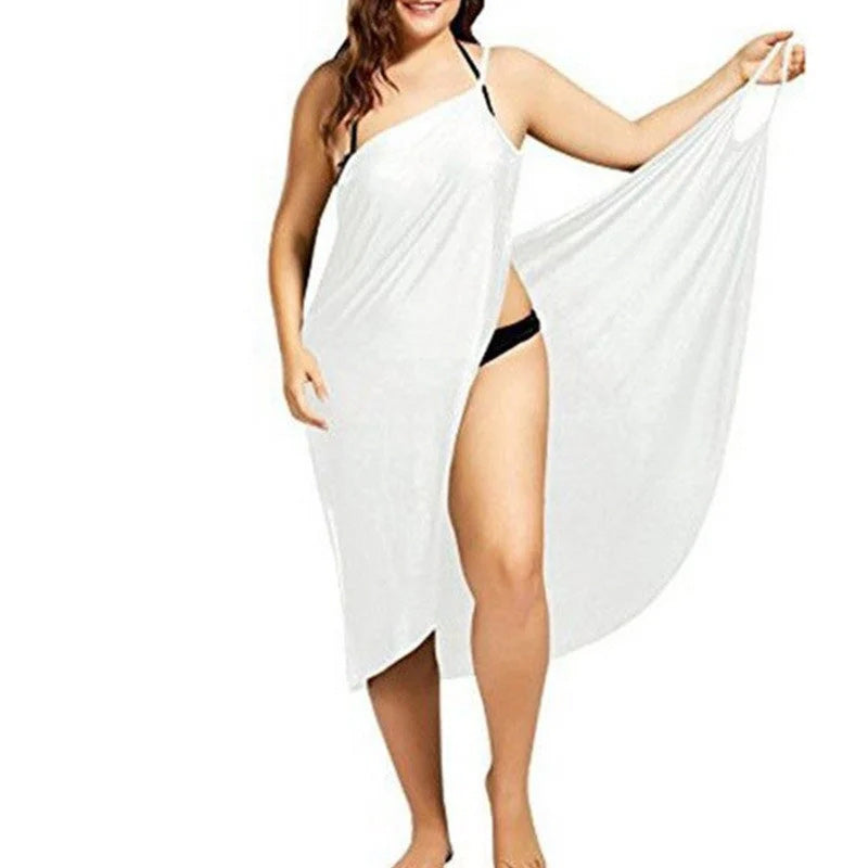 Elegant strandkjole for kvinner med v-hals. Perfekt som cover-up eller sommerkjole på ferie. Lett og behagelig.