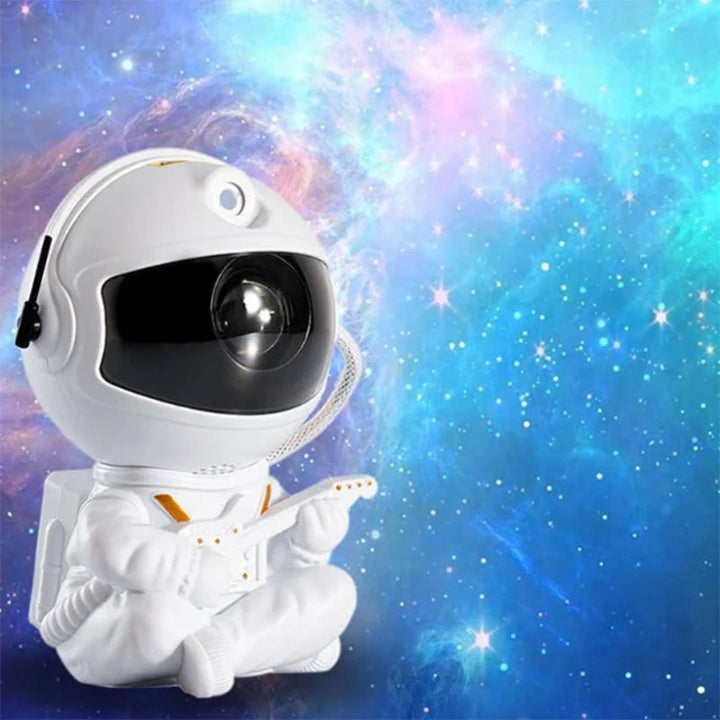 Magisk astronaut nattlys som transformerer taket til en stjerneklar galakse.