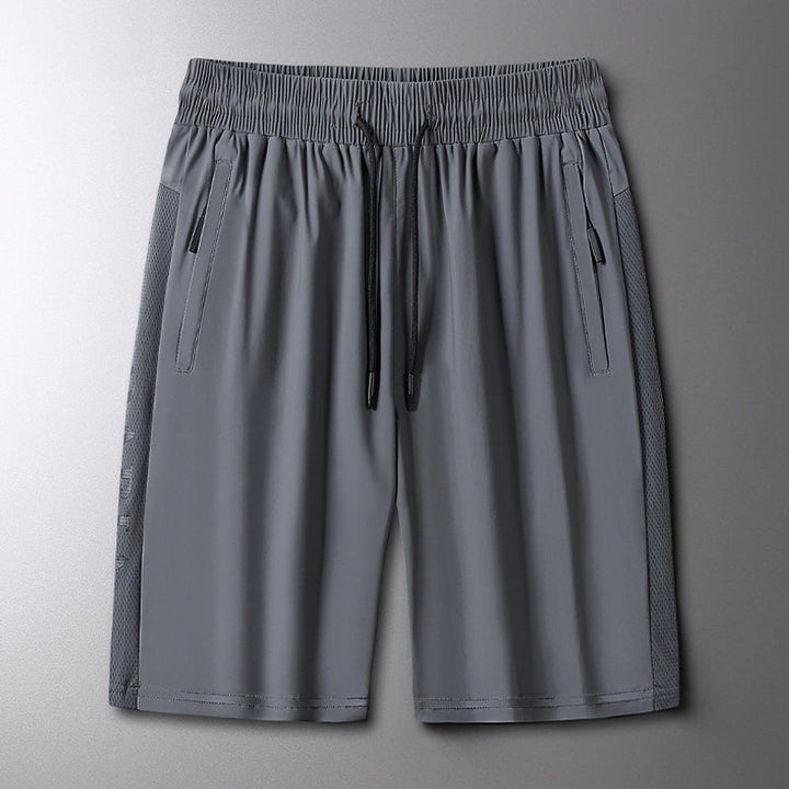 Slitesterke herre shorts med elastisk midje, perfekt for løping, sport og sommer.