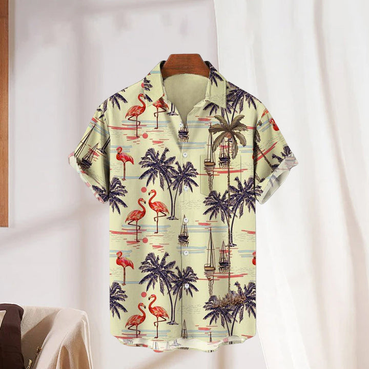 Mønstret herreskjorte i polyester med fargerike flamingoer, super for tropisk sommerstil. Dyretrykk.