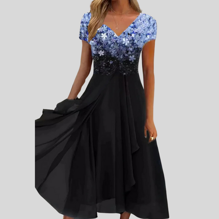 Elegant mønstret damekjole med firkantet hals, perfekt som allsidig midi selskapskjole.