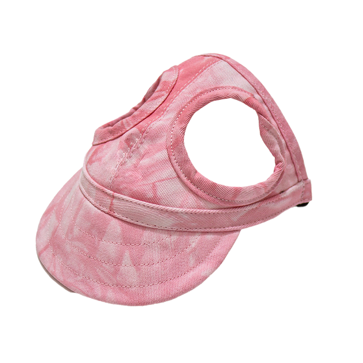 Blå UV-solhette til hund, detaljer om stoff og ventilasjon for sommerbruk.