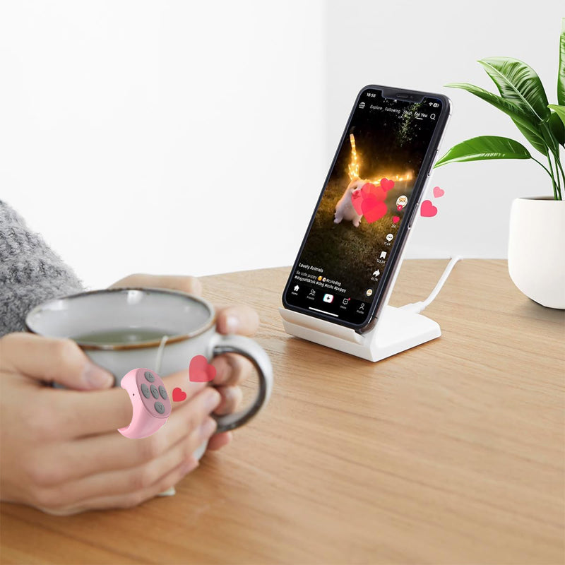 Universell Bluetooth fjernkontroll for smarttelefon, gir enkel trådløs kontroll av media og kamera.
