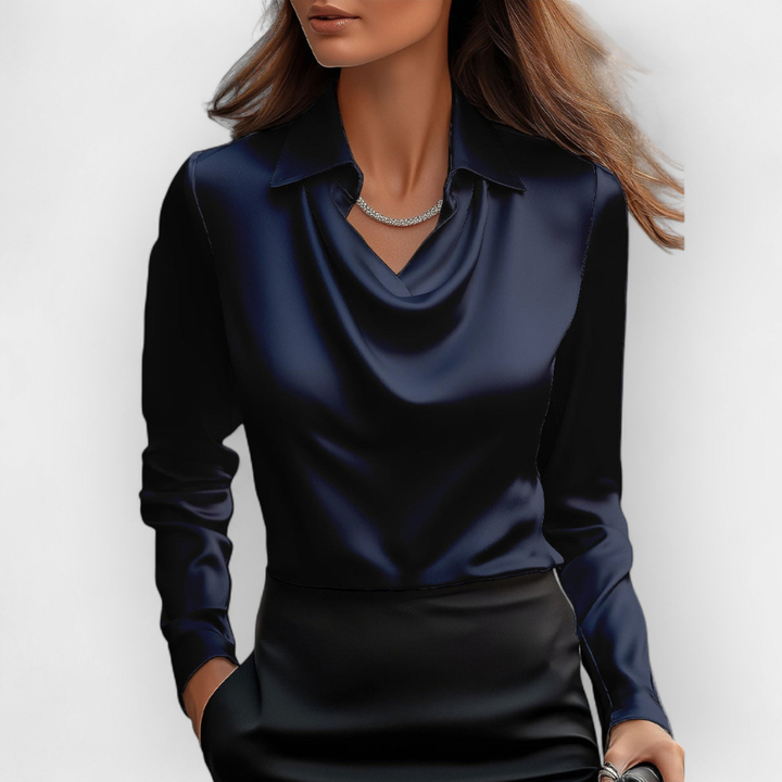 Allsidig langermet damebluse med elegant vannfallskrage for både arbeidsantrekk og fest.