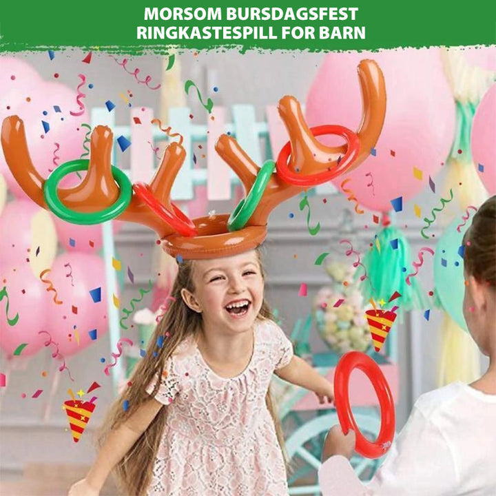 Familie julespill: Oppblåsbart gevir ringkast med røde ringer for festlek.