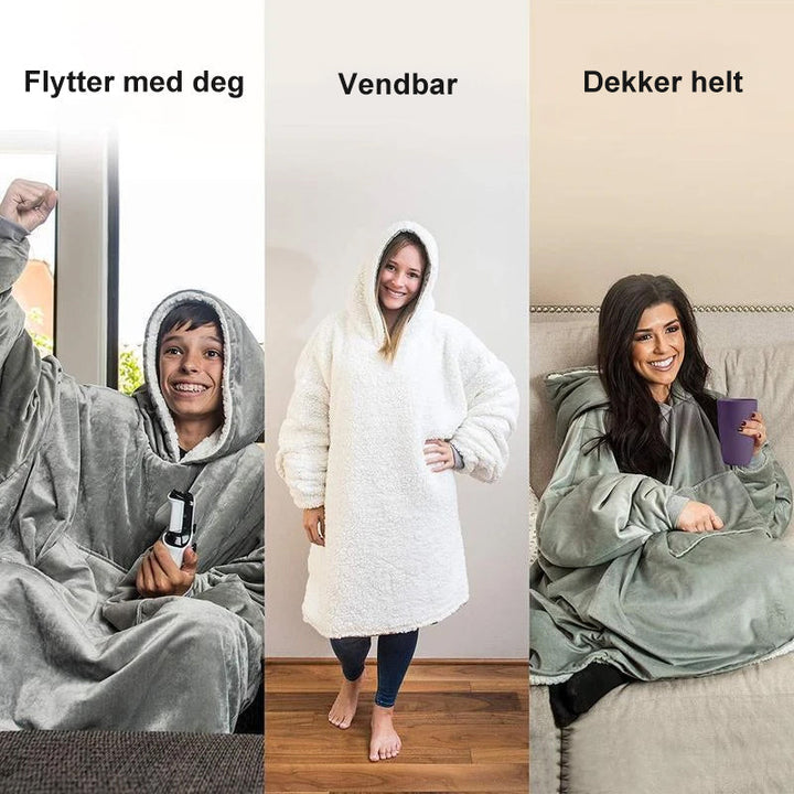Nærbilde av mykt sherpa stoff på bærbart hettepledd for kvinner; koselig og varmt.