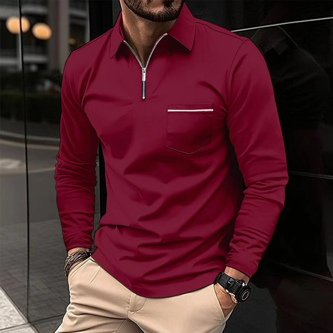 Stilren langermet polo for menn, laget av bomullsblanding. Ideell for en klassisk og komfortabel hverdagslook.
