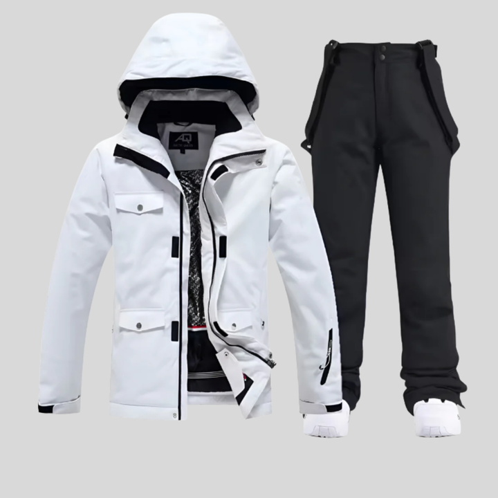 Kvinners skisett i levende farge, vist på modell. Komfortabelt og varmt vintersportantrekk for snøaktiviteter.