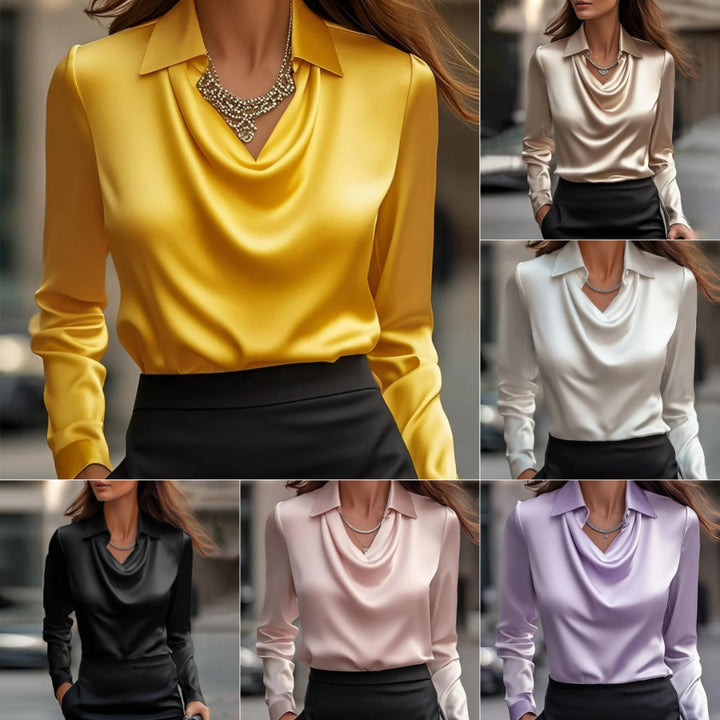 Elegant damebluse med svingekrage og lange ermer, perfekt for kontor eller fest.