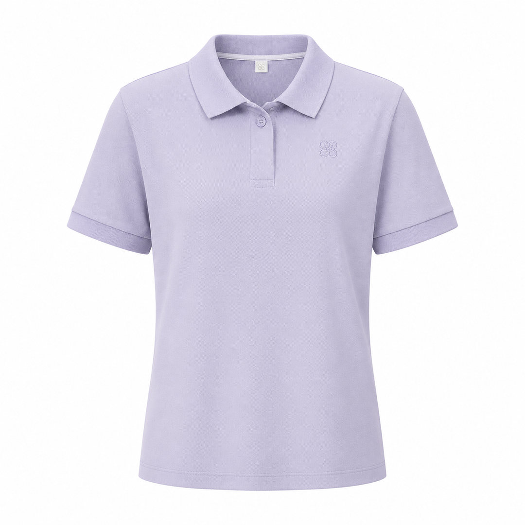 Beige dame polo skjorte med asymmetrisk kant og krage. Ideell for komfortabel hverdag og kontorstil.