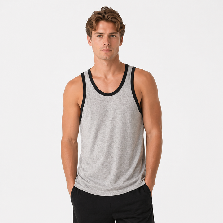 Ermeløs herresinglet i myk bomull, designet for optimal komfort under sport og hverdagsbruk.