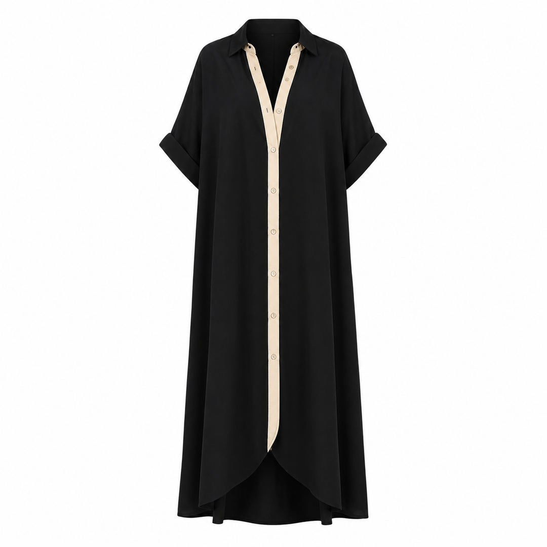 Modell iført komfortabel Dame Maxi Skjortekjole med løs passform. Perfekt elegant sommerkjole med kontrastdetaljer.