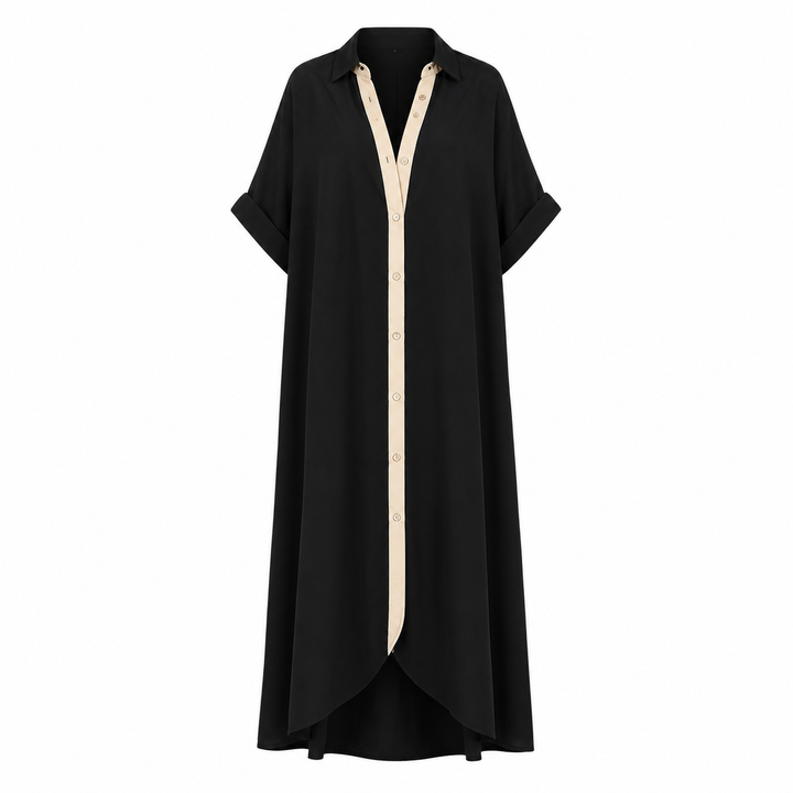 Modell iført komfortabel Dame Maxi Skjortekjole med løs passform. Perfekt elegant sommerkjole med kontrastdetaljer.