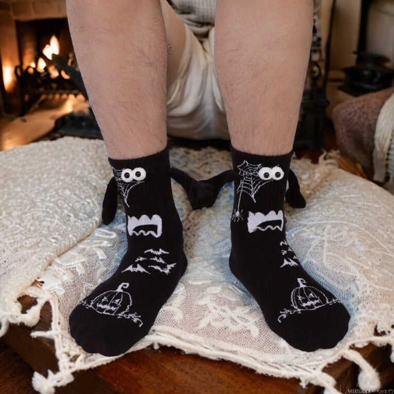Unisex magnetiske julesokker, hånd-i-hånd design, ideelle som festlige sokker for par.