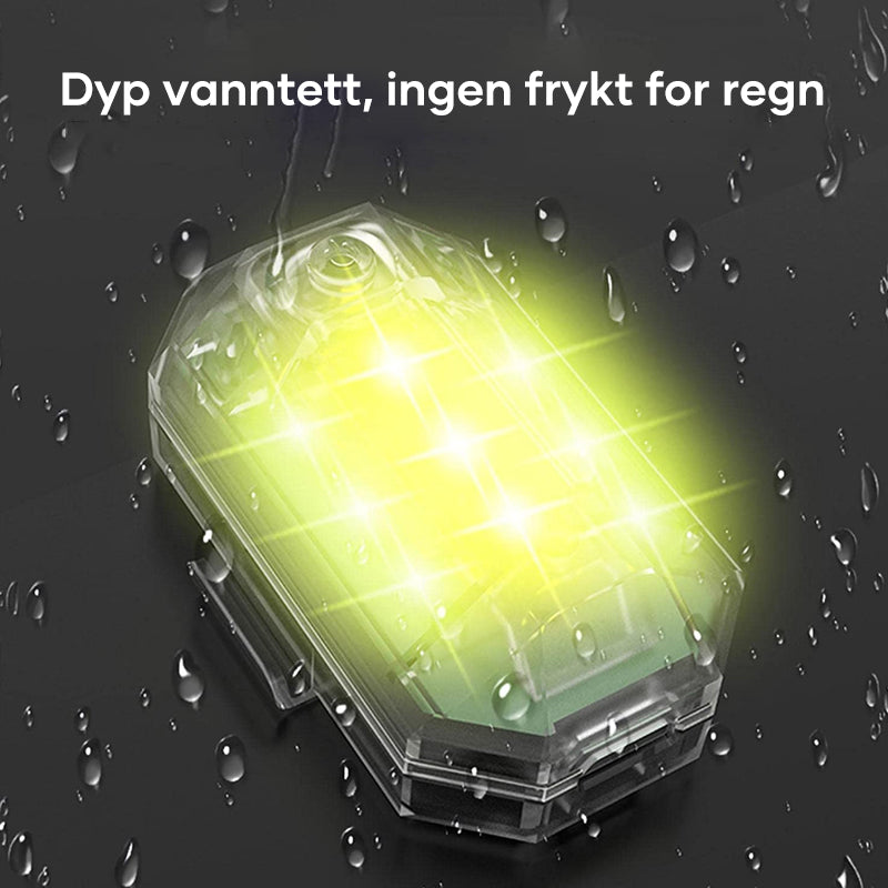 Kompakt vanntett LED strobelys. Trådløst, 7 farger for sykkel, drone, kjøretøy. Enkel montering.