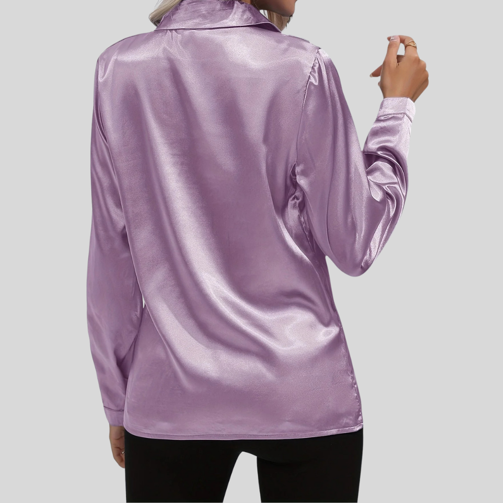 Komfortabel elegant damebluse. Langermet skjorte som kombinerer mote og funksjonalitet.