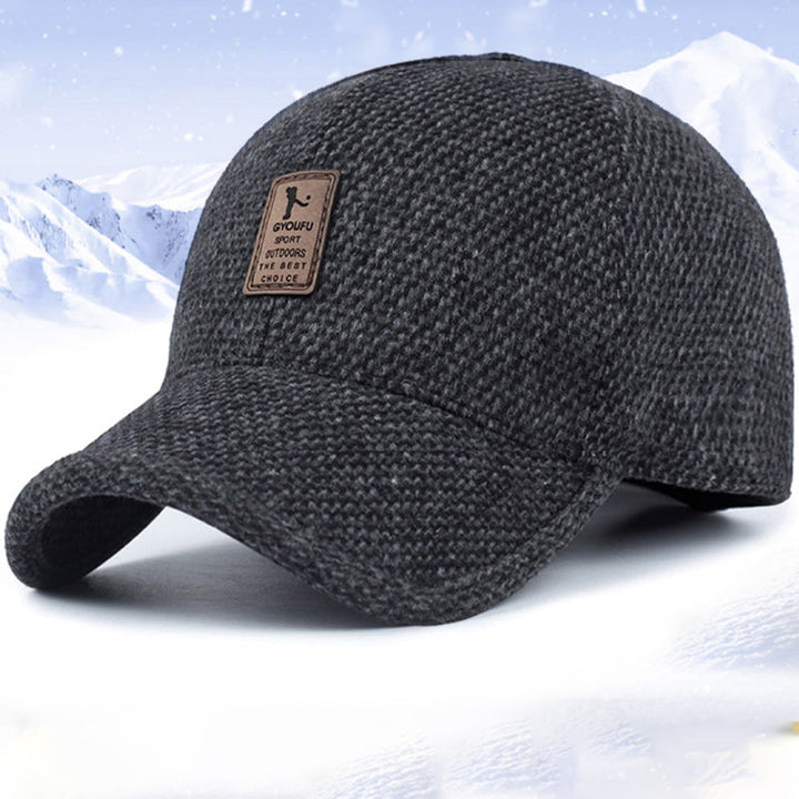 Stilig vinterhatt med øreklaffer. Komfortabel unisex ullcaps, ideell for kalde dager. [[lstfy-media:2]]