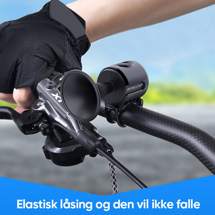 Nærbilde av kontrollknappen på et elektrisk sykkelhorn og alarm. Robust design.