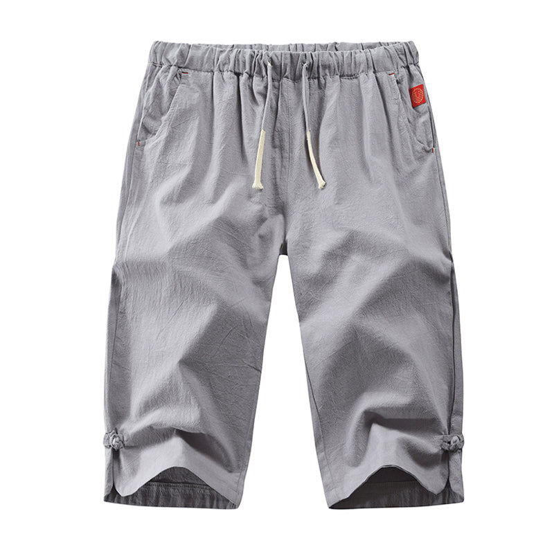 Moderne menns linshorts i bomull, komfortabel og pustende, flott for strand, sommer og fritid.