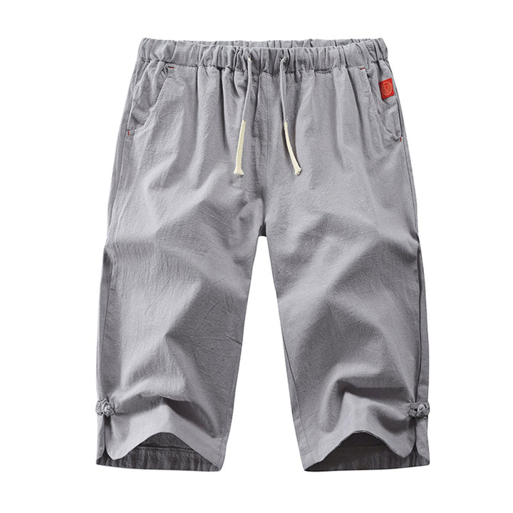 Moderne menns linshorts i bomull, komfortabel og pustende, flott for strand, sommer og fritid.