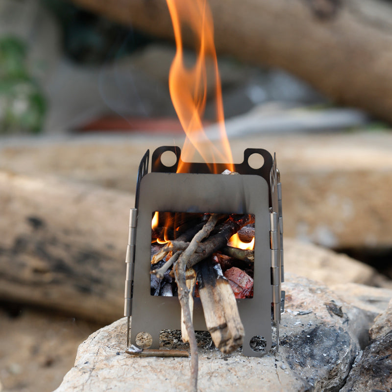 Bærbart grillsett i rustfritt stål for utendørs bruk. Perfekt utegrill for camping og friluftsliv.