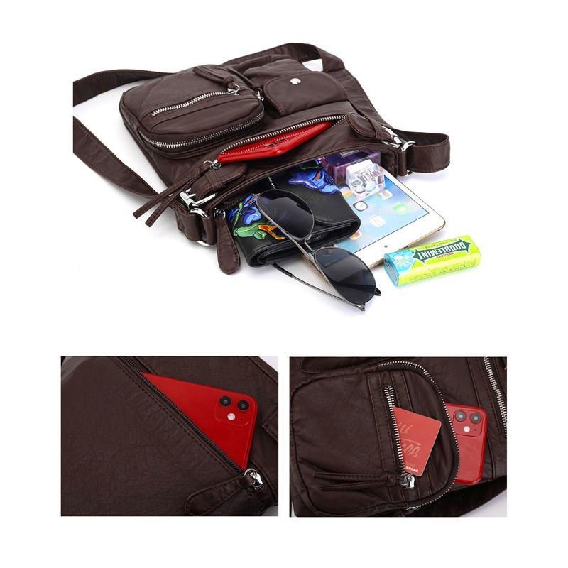 Nærbilde av elegant vanntett PU-lær crossbody-veske for dame, med solide sømmer og justerbar stropp.